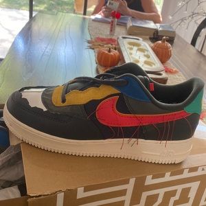 NIKE Air Force 1’s, size 9.5 in men, 11 in women. PRACTICALLY NEW.
